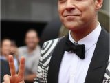 Robbie Williams Lebenslauf Deutsch Robbie Williams Starporträt News Bilder